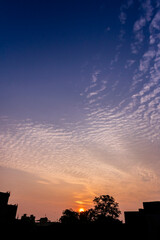 Fototapeta premium Amazing cloud formation in colourful sky during a monsoon sunrise morning