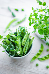 Bowl with sweet pea pods