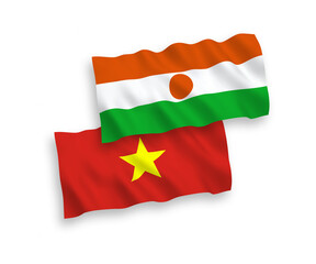 Naklejka premium Flags of Republic of the Niger and Vietnam on a white background