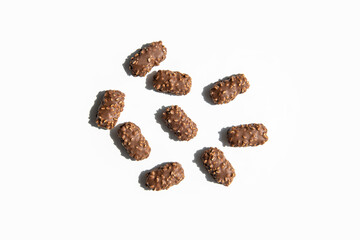 Chocolate candy bar on a white background. Top view, flat lay