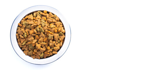 Round metal bowl for pets with dry food. Isolated on white background. View from above. Full plate with a slide