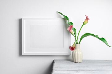 Blank landscape artwork frame mockup with flowers