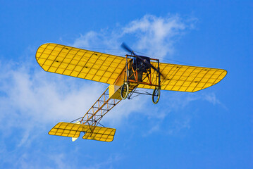 Overflight of a vintage airplane, a replica of the Bleriot XI.