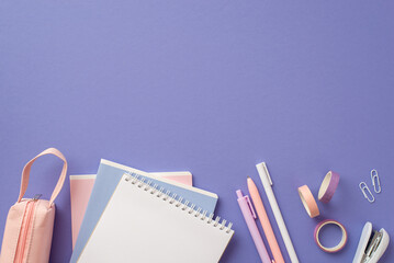 Back to school concept. Top view photo of notebooks pens adhesive tape stapler clips and pink...