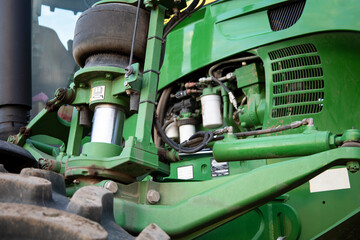 Close-up of the tractor details where the engine and air cushions are visible for the smooth running of the tractor.