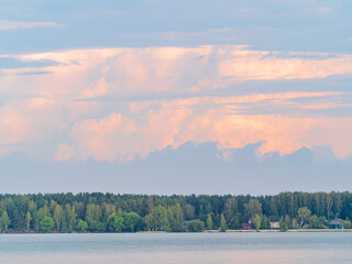 Blue lake with cloudy sky, natural background