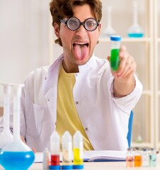 The funny crazy chemist doing experiments and tests