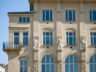 Fototapeta na wymiar Facade of modern building in Krakow, Poland. Tourism in Europe.
