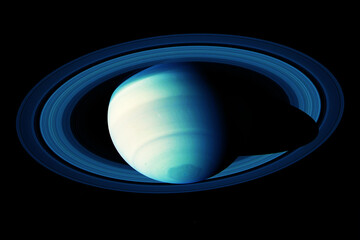 Planet Saturn on a dark background. Elements of this image furnished by NASA