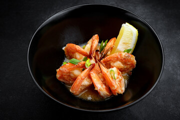 Fried shrimp in sauce in a plate