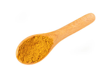 Turmeric powder in wooden spoon on white , top view