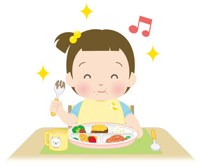 楽しそうにごはんを食べる小さな女の子2