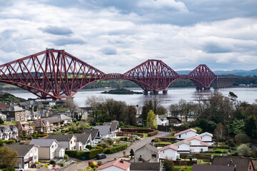 Landscape view of Queensferry Railway bridge construction above the village of North Queensferry on...