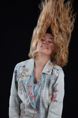 Happy woman in a jean jacket