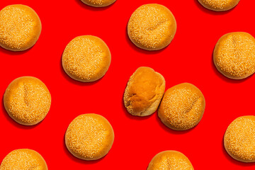 Homemade freshly baked burger bun on isolated background. Top view
