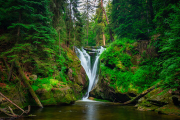 Fototapeta na wymiar A beautiful Szklarki waterfall in the Karkonosze Mountains, Poland