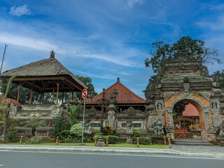 Fototapeta premium Ubud Royal Palace is located at center of Ubud City and a part of palace opens to public. There are many statue and engravings.
