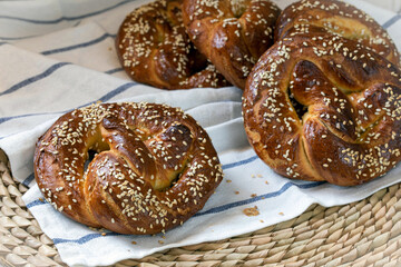 Pretzel sprinkled with sesame seeds and coarse salt