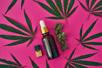 Fresh marijuana with oil and e-cigarette cartridge