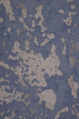 blue wall worn and white paint visible, background