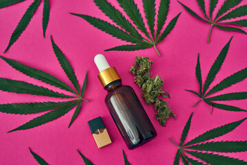 Green marijuana with oil and e-cigarette cartridge