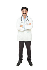 Portrait happy indian male doctor with stethoscope standing cross arms looking at camera, healthcare and medical concept.