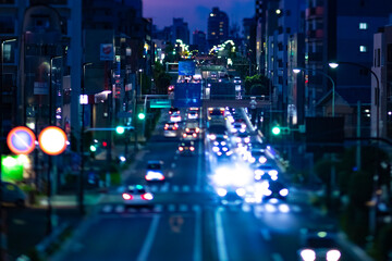 Fototapeta na wymiar A miniature traffic jam at the street in Setagaya Tokyo at dusk.