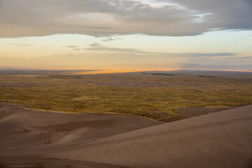 Morning Light Over Valley Below Dunes