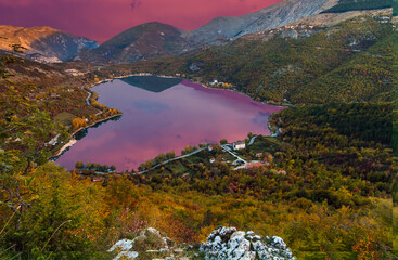 Stunning view of the heart-shaped Scanno lake at sunrise, the most famous and romantic lake in Abruzzo national Park, central Italy
