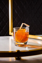 Cocktail with ice, oranges