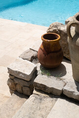 Naklejka premium ceramic pot by the pool