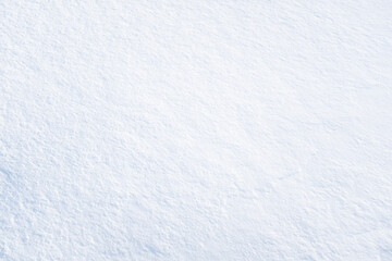 Snow background, top view. Fresh snow texture for publication, poster, screensaver, wallpaper, postcard, banner, cover, post. High quality photography