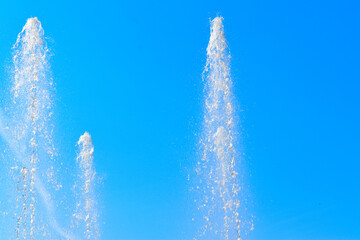 fountain jets in the blue sky