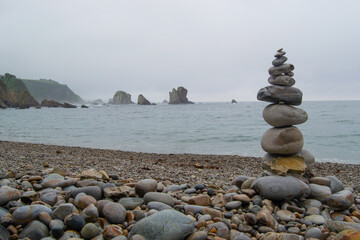 mountain of stones in beach of round stones