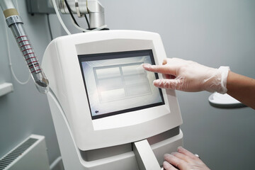 A modern laser device is ready for the antiaging gynecological procedures in a clinic