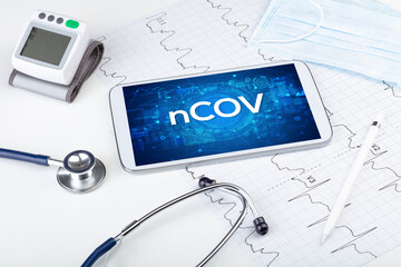 Close-up view of a tablet pc with medical abbreviation