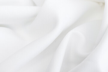 Naklejka na ściany i meble Smooth elegant white silk or elegant satin texture can be used as background.