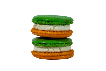 Macaron Stack: Two stacks of colorful macarons, each composed of three distinct layers in shades of green, white, and orange. A photorealistic representation.