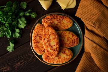 Chvishtari, corn flour tortillas with cheese, pastries, Georgian cuisine, Mchadi, homemade, top view, on a wooden table, no people,