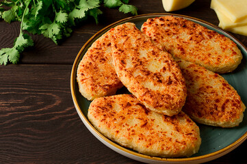 Chvishtari, corn flour tortillas with cheese, pastries, Georgian cuisine, Mchadi, homemade, top view, on a wooden table, no people,