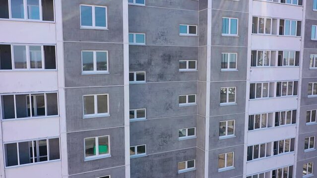 Construction of a multi-storey panel reinforced concrete house. Safe ramp at the entrance to the building. Construction site safety