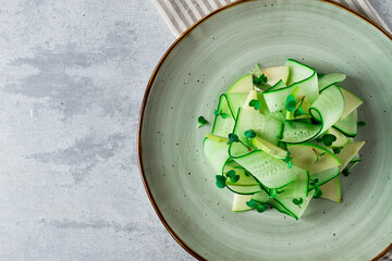 Spring, green salad, cucumber with apple, top view, close-up, no people, microselen radish, healthy eating, spring salad, georgian salad, gazaphuli,
