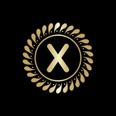 Fototapeta premium Initial X Golden leaf and circle logo design vector. Golden beauty X Logo and business symbol and alphabets vector design