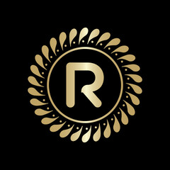 Fototapeta premium Initial R Golden leaf and circle logo design vector. Golden beauty R Logo and business symbol and alphabets vector design