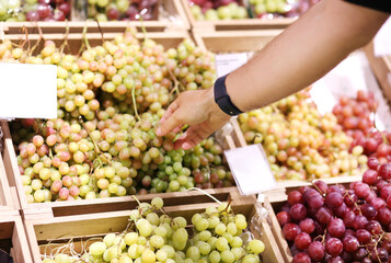 buying grape at the market