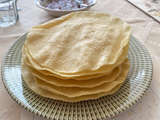 Stack of poppadoms. 
