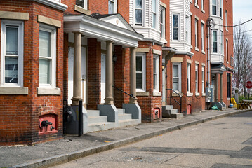 Historic commercial building on a street in Old Port in city of Portland, Maine ME,