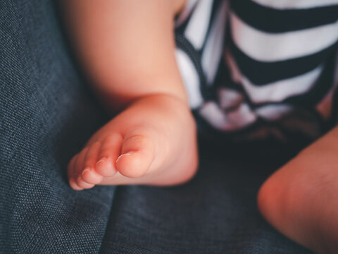 tiny baby feet closeup.Beautiful conceptual image of maternity.