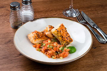 Slices of salmon tartare Served with Spicy Sauce