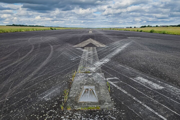 Old abandoned airport landing path - airplane landing strip